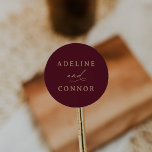 Elegant Burgundy and Gold Calligraphy Wedding Classic Round Sticker<br><div class="desc">Add a finishing touch to your wedding mailings,  decor,  and more with these modern and elegant round stickers,  featuring gold typography on a rich burgundy background.</div>