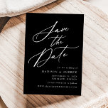 Elegant Calligraphy Black and White Wedding Save The Date<br><div class="desc">Elegant save the date featuring "Save the Date" displayed in a white calligraphy script with a black background. Personalise the calligraphy save the date with your names,  wedding date and location,  and wedding website. The non-photo design coordinates with our Elegant Calligraphy wedding collection.</div>