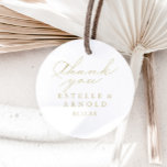 Elegant Calligraphy Gold Thank You Wedding Favour  Classic Round Sticker<br><div class="desc">This elegant calligraphy gold thank you wedding favour classic round sticker is perfect for a rustic wedding. The simple and stylish design features classic and fancy script typography in gold. Make the sticker labels your own by including your names, the event (if applicable), and the date. These stickers can compliment...</div>