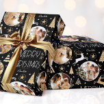 Elegant Christmas Reindeer Photo Collage Black Wrapping Paper<br><div class="desc">Make your Christmas gifts extra special with this elegant Art Deco style wrapping paper. You can personalise it with a name and three photos of your family, friends or pets. This seamless pattern features leaping reindeer, festive trees and stars in a colour palette of black, white and a gold coloured...</div>