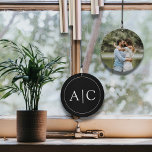 Elegant Classic Black Monogram Couple Photo Wind Chime<br><div class="desc">Add a personal touch to your home or garden with this Elegant Classic Black Monogram Couple Photo Wind Chime. Featuring a sleek black design, this wind chime can be personalised with your couple's initials and a cherished wedding photo on the back, making it a perfect keepsake to celebrate your special...</div>