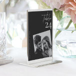 Elegant Classy Black and White Wedding Photo Table Number<br><div class="desc">Celebrate your special day with our enchanting Elegant Classy Black and White Wedding Photo Table Number. This beautifully designed table number adds a touch of personalised elegance to your wedding decor, blending the timeless allure of black and white with modern romance. Key Features: Custom Photo: Showcase your unique love story...</div>