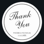 Elegant Classy Black and White Wedding Thank You Classic Round Sticker<br><div class="desc">Traditional wedding sticker in classic black and white featuring a simple design with "Thank You" in an elegant calligraphy inside a thin border.  This classy design is perfect for a formal wedding.  These stickers are great as envelope seals or for party favours.</div>