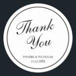 Elegant Classy Black and White Wedding Thank You Classic Round Sticker<br><div class="desc">Traditional wedding sticker in classic black and white featuring a simple design with "Thank You" in an elegant calligraphy inside a thin border.  This classy design is perfect for a formal wedding.  These stickers are great as envelope seals or for party favours.</div>
