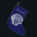 Elegant Coastal Beach Sea Shell Monogram Small Christmas Stocking<br><div class="desc">Elegant blue and white coastal cottage beach house style. White colored sea shell with monogrammed name. Blue background with half tone look.</div>