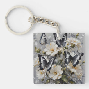 "Elegant Contrast: Black And White Butterflies Key Ring