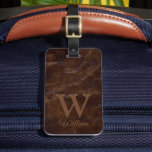 Elegant Dark Brown Cow Leather Texture Monogrammed Luggage Tag<br><div class="desc">A dark Brown Cow Leather Textured Travel Tag with custom Initials and names. Makes a perfect gift for Men in your life; Dads,  Groomsmen,  Corporate gifts for bosses,  employees,  clients,  granddads,  grandpas,  best friends,  or any travel enthusiast.</div>
