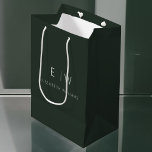 Elegant Dark Green Modern Minimalist Monogram Name Medium Gift Bag<br><div class="desc">Present your gifts in style with our Dark Green Modern Minimalist Monogram Name Gift Bag. This elegant bag boasts a clean and contemporary design, featuring a customisable monogram that adds a personalised touch to your gift-giving. Crafted with quality in mind, this bag is both sophisticated and minimalist, making it suitable...</div>
