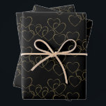 Elegant Decorative Heart Charms Gold and Black Wrapping Paper Sheet<br><div class="desc">The artwork features charming decorative hearts in an elegant pattern in gold and black colour scheme. 
For questions,  contact the artist at wafadahdalcreates@gmail.com. © Wafa Y. Dahdal - All Rights Reserved. WD Art</div>