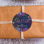Elegant Deep Blue Pink Winter Wonderland Christmas Classic Round Sticker<br><div class="desc">Add a touch of magic to your holiday gifts with this customisable Christmas sticker! Set against a mesmerising backdrop of deep blue and purple hues, the sticker is adorned with whimsical snowflakes and stars, creating a festive atmosphere. The words "Merry Christmas" are elegantly scripted in white and pink/purple gradient, radiating...</div>