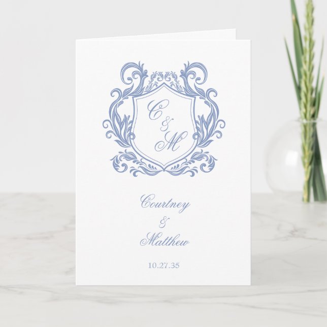 Elegant Dusty Blue Monogram Crest Wedding Program (Front)