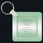 Elegant Emerald Glitter & Silver Wedding Rings   Key Ring<br><div class="desc">Beautiful stylish and very elegant wedding thank you favour keychain with a glamourous emerald green coloured sparkly sequin border encased in a matching coloured glitter frame printed on a pretty green gradient background, in the background are two shiny silver wedding rings with diamond hearts decoration. A romantic design for your...</div>