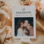 Elegant Family Photo and Name | Season's Greetings Holiday Card<br><div class="desc">This simple and minimalist, elegant black and white holiday card features your personal photo on the front, and an additional photo on the back, for a total of two of your favorite family photos. Classic calligraphy along with modern text for your family name add a stylish touch and says "Season's...</div>