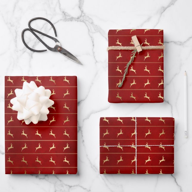 Elegant farmhouse red gold foil reindeer pattern wrapping paper sheet (Front)