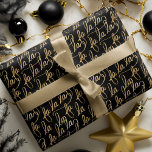 Elegant Faux Fa la Script Typography Black & Gold Wrapping Paper<br><div class="desc">Simple and elegant fa la la wrapping paper. Design features our hand-drawn fa la la typography in faux gold against a bold black background. Typography designed by Moodthology papery.</div>