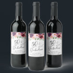 Elegant Floral 50th Birthday Party Wine Label<br><div class="desc">Elegant wine labels for her 50th birthday party featuring "50 & Fabulous" in a stylish script and watercolor bouquets of burgundy red,  blush pink and purple florals with light sage greenery. Easily personalise with her name and the party date.</div>