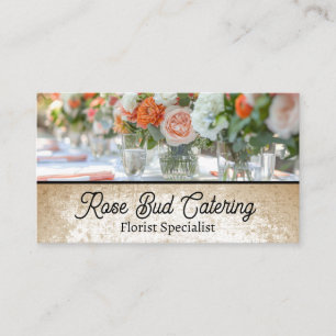 Elegant Floral Centerpiece on White Table Cloth Business Card