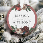 Elegant Floral First Christmas Wedding Keepsake Ornament<br><div class="desc">A lovely keepsake ornament celebrating the bride and groom's first year as husband and wife, this design features elegant floral bouquets of roses and peonies above and below your custom text. A colourful ring of dusty rose red frames the design. Personalise the front of the design with the bride and...</div>