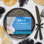 Elegant Floral Ocean Beach Wedding RSVP Card<br><div class="desc">Immerse yourself in the beauty of our Elegant Floral Ocean Beach Wedding RSVP Card, a piece of art designed with love and attention to detail by Mylini Design. This sleek and stylish card showcases a beautiful floral design against the serene backdrop of an ocean beach, merging the majesty of nature...</div>