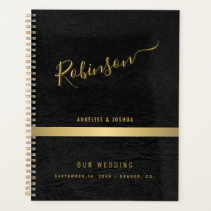 Elegant gold and black modern script wedding planner