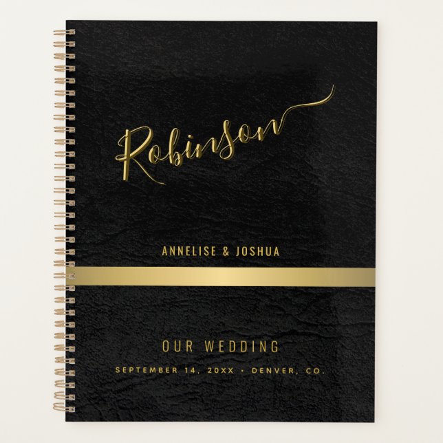 Elegant gold and black modern script wedding planner (Front)