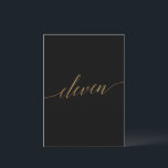 Elegant Gold & Black Table Eleven Table Number<br><div class="desc">This elegant gold and black table eleven table number is perfect for a simple wedding. The neutral design features a minimalist card decorated with romantic and whimsical faux gold foil typography. The card prints on the front and back (double-sided). Other table numbers in the collection are sold separately. Please Note:...</div>