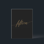 Elegant Gold & Black Table Number Fifteen<br><div class="desc">This elegant gold and black table fifteen table number is perfect for a simple wedding. The neutral design features a minimalist card decorated with romantic and whimsical faux gold foil typography. The card prints on the front and back (double-sided). Other table numbers in the collection are sold separately. Please Note:...</div>