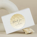 Elegant Gold Glitter Thank You Classic Round Sticker<br><div class="desc">These stickers,  featuring faux gold glitter and elegant script font text,  are the perfect way to say thank you. Great for bridal showers,  birthdays or your small business,  easily edit the customisable text using the "personalise this template".</div>