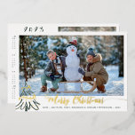 Elegant Gold Merry Christmas Photo 2023 Calendar Foil Holiday Card<br><div class="desc">CONTACT THE DESIGNER FOR THE CURRENT YEAR CALENDAR. Elegant holiday greeting card featuring a real metallic gold foil MERRY CHRISTMAS title in a modern hand lettered calligraphy script and gold foil Christmas tree accents with one photo on the front and the back features one photo and a 2023 year-at-a-glance calendar...</div>