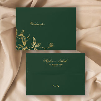 Elegant gold monogram floral dark green wedding envelope