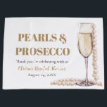 Elegant Gold Pearls and Prosecco Bridal Shower Large Gift Bag<br><div class="desc">Indulge in the epitome of bridal elegance with our Elegant Gold Pearls and Prosecco Bridal Shower Large Gift Bag. Featuring a luxurious blend of shimmering gold tones and delicate pearl accents, this bag exudes sophistication. The subtle imagery of sparkling prosecco adds a touch of celebration to the occasion. Spacious and...</div>
