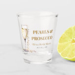Elegant Gold Pearls and Prosecco Bridal Shower Shot Glass<br><div class="desc">Indulge in elegance with our Elegant Gold Pearls and Prosecco Bridal Shower Shot Glass. This exquisite shot glass exudes sophistication, featuring shimmering gold accents and delicate pearls that perfectly complement the celebratory spirit of your bridal shower. Sip on your favourite liqueur or toast with a shot of prosecco in style,...</div>