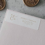 Elegant Gold Script Monogram Return Address Label<br><div class="desc">These elegant gold script monogram return address labels are perfect for a simple wedding. The minimalist gold and white design features fancy romantic typography with modern glam style. Customisable in any colour. Keep the design minimal and classy, as is, or personalise it by adding your own graphics and artwork. These...</div>