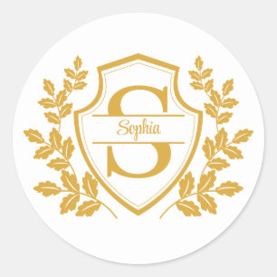 Elegant golden Leaves Crest Floral Monogram Script Classic Round Sticker