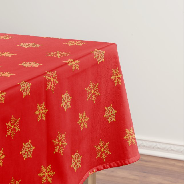 Elegant Golden Snowflake Pattern on Red Tablecloth (In Situ)