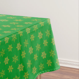 Elegant Golden Snowflakes on Green Tablecloth