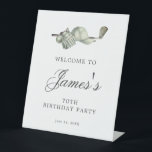 Elegant Golf 70th Birthday Party Welcome Pedestal Sign<br><div class="desc">Welcome your guests with this elegant tabletop pedestal sign. The top of is decorated with golf accessories - a golf club, golf ball, hat and gloves. The watercolor design creates a traditional and classic aesthetic. Perfect for a birthday bash at the club or a backyard BBQ. All of the text...</div>