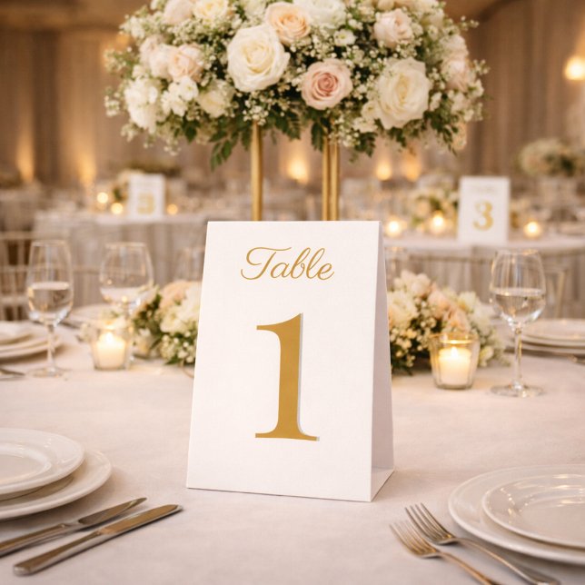 Elegant Ivory and Gold Table Numbers (Elegant ivory and gold table number displayed at a luxury anniversary reception.)