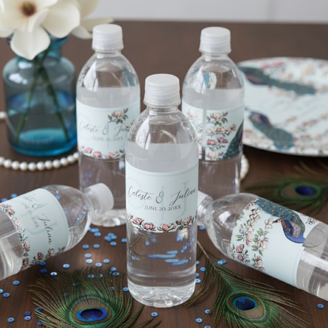 Elegant Light Blue Floral Peacock Wedding Water Bottle Label (Elegant Blue Floral Peacock Water Bottle Labels. Teal Peacock Feathers, Magnolia Flowers & Monogram)