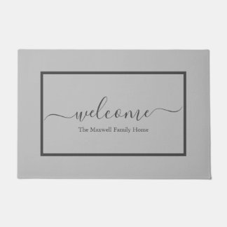 Elegant light grey script family name welcome doormat