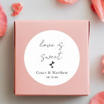 Elegant Love is Sweet Wedding Sweet Favour Classic Round Sticker<br><div class="desc">The "Elegant Love is Sweet Wedding Sweet Favour Classic Round Sticker" is a graceful expression of appreciation. Its refined design and heartfelt message convey love and gratitude with timeless elegance. Ideal for sealing favour bags or adorning favour boxes, this sticker adds a touch of sophistication to your wedding favours. Its...</div>