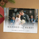 Elegant Married and Merry Photo Newlywed Christmas Holiday Card<br><div class="desc">This simply chic custom photo newlywed holiday card template features an elegant, minimalist, modern design. The default card shape is standard sharp corners, but rounded corners also work wonderfully with this design and lend a soft look, so try both shapes in editing mode and see which strikes your fancy! The...</div>