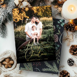 Elegant Merry Christmas Modern Photo Pine Cone Foil Holiday Card<br><div class="desc">Get in the spirit with this elegant script calligraphy family photo real foil (gold,  silver,  or rose gold) holiday card! Modern watercolor foliage branches with berries,  holly,  pine,  cotton,  and eucalyptus on muted earth tones elevate this whimsical and festive card design on the back.</div>