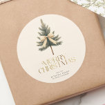 Elegant Merry Christmas Pine Tree Bow Family Classic Round Sticker<br><div class="desc">Add a festive touch to your gifts with these elegant "Merry Christmas" stickers! Featuring gold script,  a pine tree bow,  and your custom family name,  they're perfect for personalising your holiday packages with style and warmth.</div>