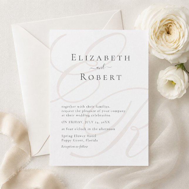 Elegant Minimalist Monogram Wedding Invitation (Elegant Minimalist Monogram Wedding Invitation on a table with white flowers)