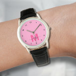 Elegant Minimalist Pink Monogram Watch<br><div class="desc">Personalised Monogram Baby Pink and Hot Magenta Watch with Simple Black Numbers. This chic, girly watch blends classic style with a fun, personalised touch. It features a bold magenta pink initial on a bright baby pink background (note: the pink is a smooth, flat colour without shimmer), with simple black numbers...</div>