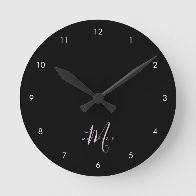 Elegant Modern Black Blush Pink Script Monogram Round Clock (Front)