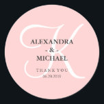 Elegant Modern Pink Monogram and Thank You Classic Round Sticker<br><div class="desc">These stylish wedding stickers have a trendy rose quartz pink coloured background,  and a large white calligraphy monogram.</div>