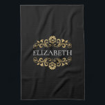 Elegant Monogram Black Gold Tea Towel<br><div class="desc">An elegant and chic black and gold flourish monogram kitchen towel. Add your name between the gold floral flourish on the front. Designed for you by Blackberry Boulevard.</div>