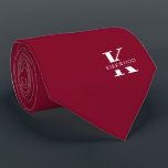 Elegant Monogram Bright Burgundy | White|One-Sided Tie<br><div class="desc">An elegant necktie featuring a bold white monogram across a bright burgundy background. On top of this monogram sits your first or last name spelled out in all capitals. If you prefer a bolder look for the personal name inside of the large letter you can do the following: Use the...</div>